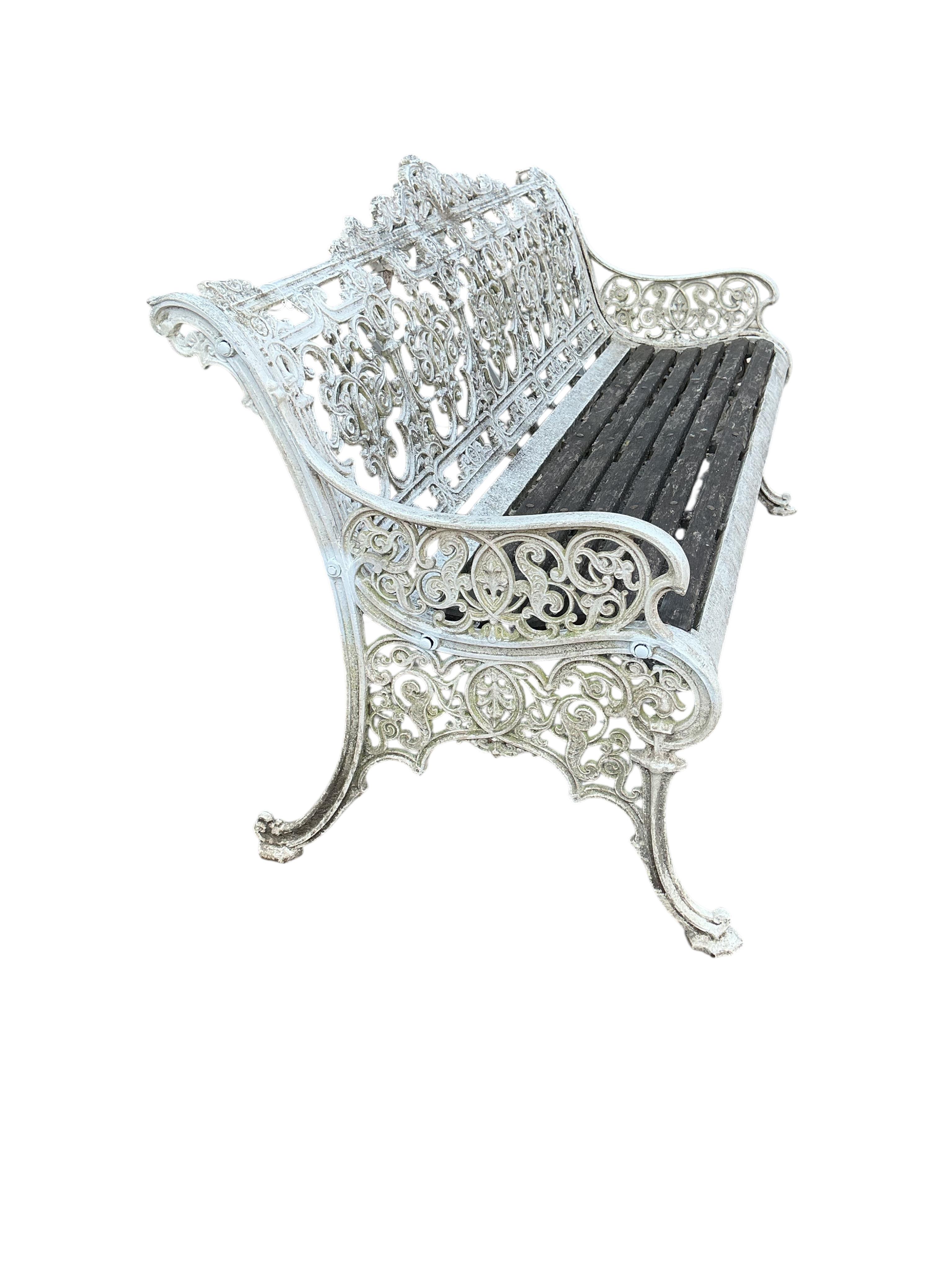 A Victorian Coalbrookdale style cast iron garden bench, width 160cm, depth 68cm, height 90cm